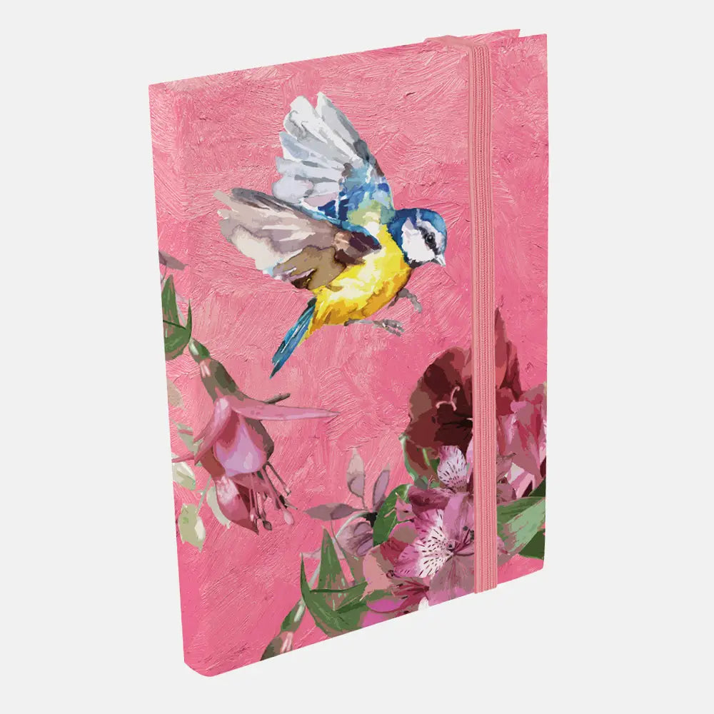 Pink notebook with bird and floral design on a white background