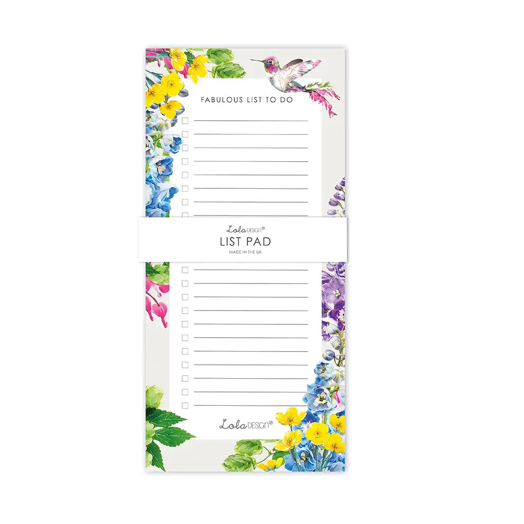 A vertical floral list pad with lined notepad pages, a white paper band across the center, and colorful watercolor flowers and a hummingbird in the corners. The band reads 'Lula Design List Pad' and 'FABULOUS LIST TO DO'.