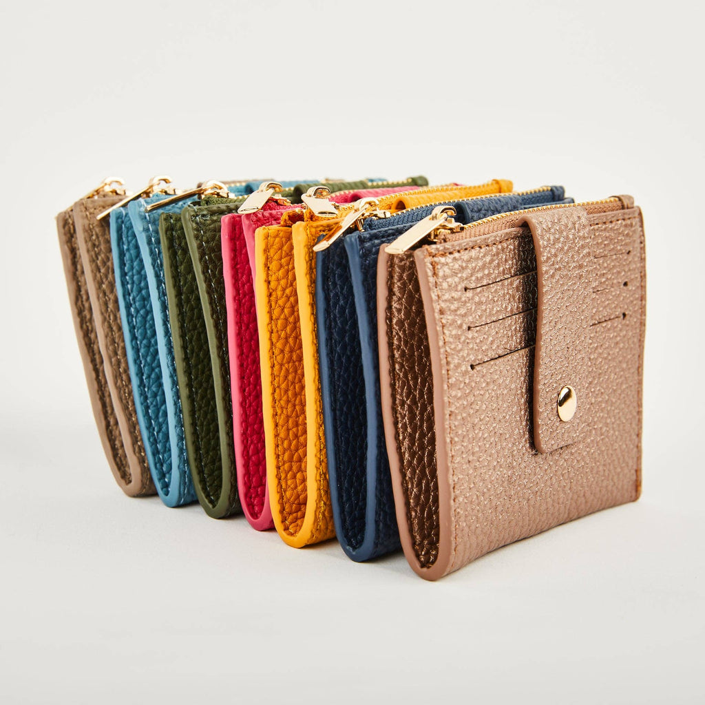 Pearl Duo purses arranged in a row in assorted colours, showing card slots and gold-tone zips