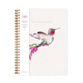 Spiral-bound notebook with a white cover featuring a colourful hummingbird and pink flowers.