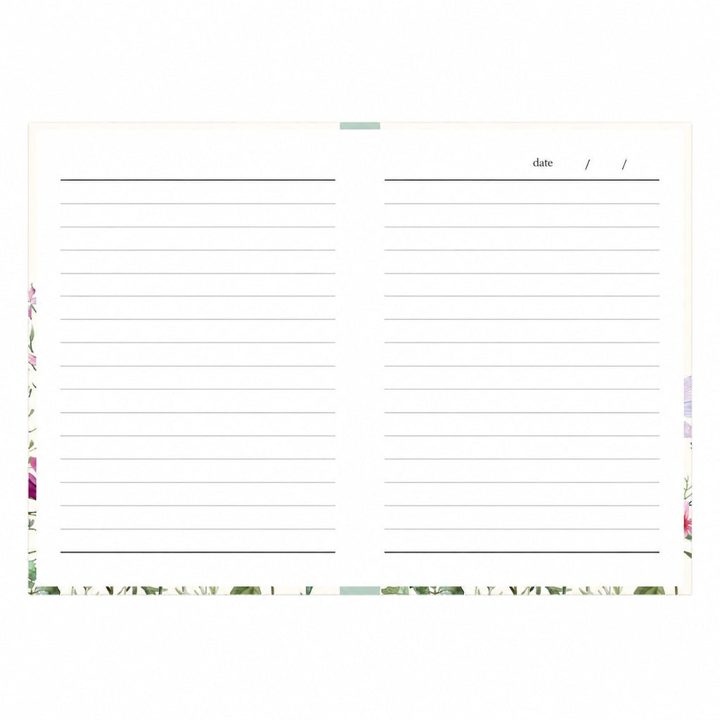 Open Wild Harmony A6 notebook showing lined white pages, a date field on the right-hand page and floral detailing around the edges.