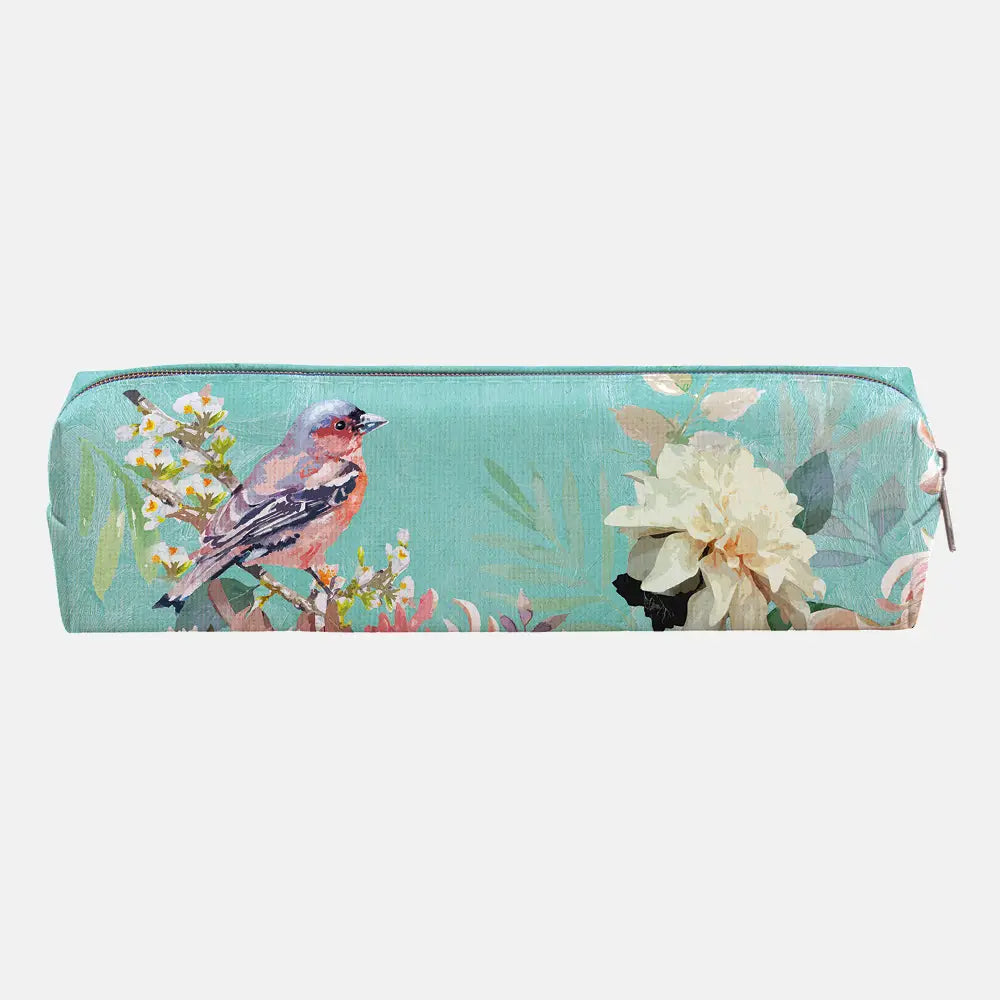 A rectangular zippered pouch with a watercolor-style print of a bird perched on a branch with white flowers and a large cream flower on a mint green background, shown against a light gray studio backdrop.